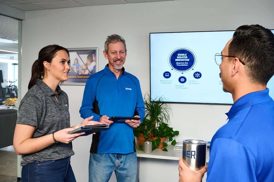 Werner associates at a technology workstation
