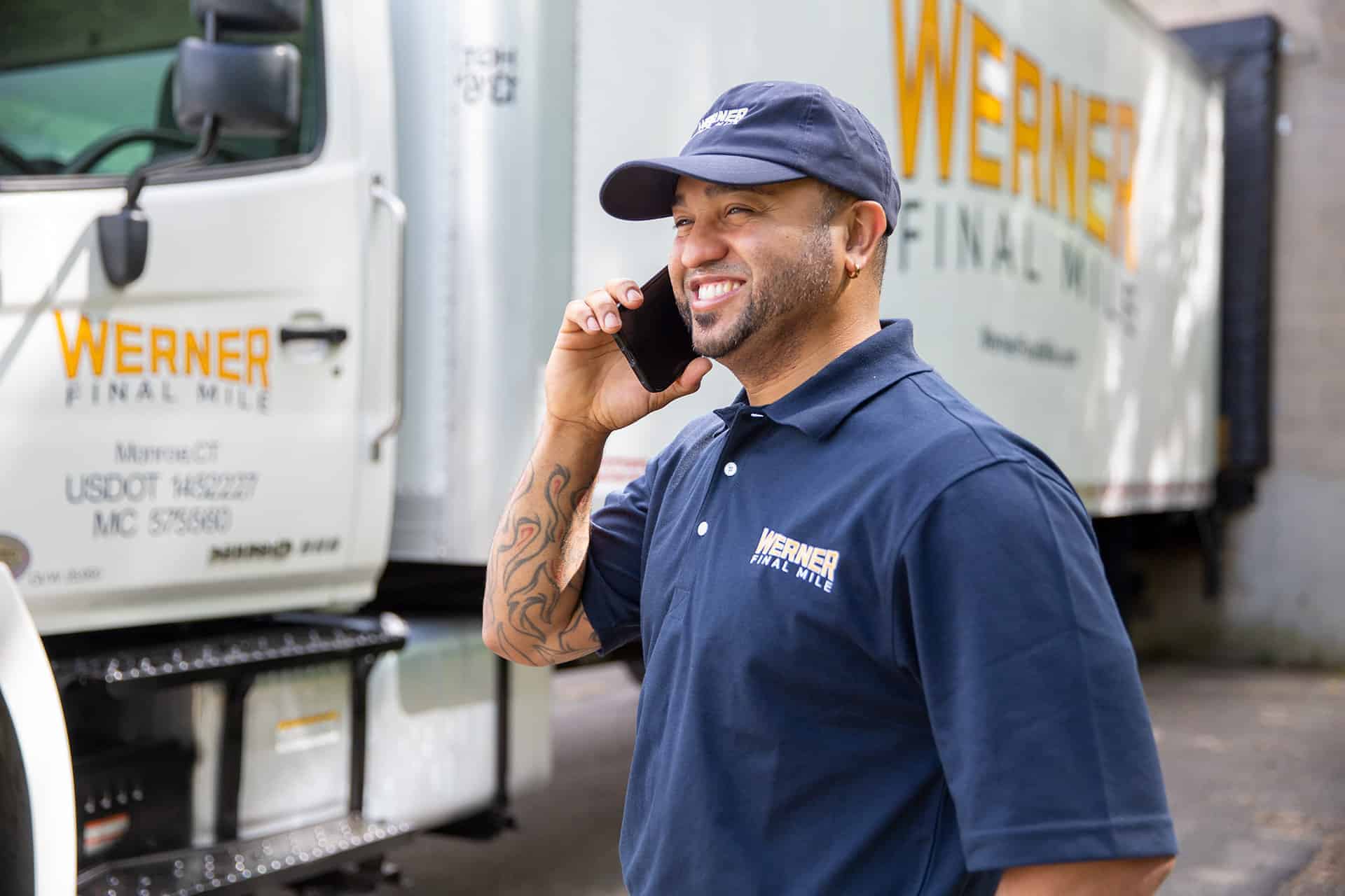 final-mile-delivery-person-on-phone final-mile-delivery-person-on-phone