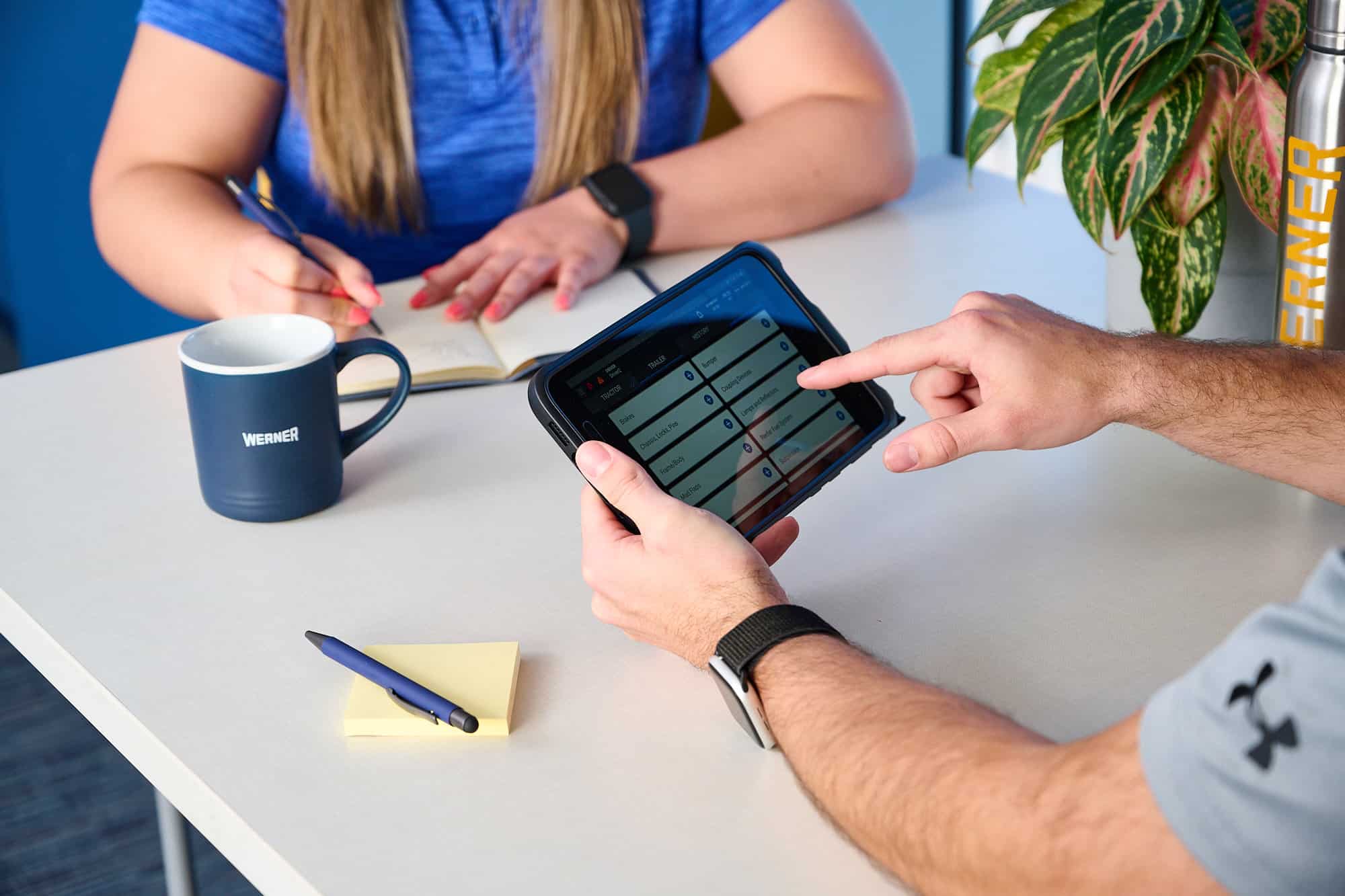 WERNER ASSOCIATES WITH TABLET